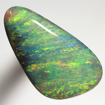 SOLID SEMI BLACK OPAL Bright sparkles of orange and green in an Iris pattern